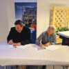 Consto og Aibel signerte kontrakt på pressekonferansen i Hammerfest onsdag 13. desember. Fredrik Okkenhaug, daglig leder Consto Anlegg Nord AS, og Berit Gjellan, prosjektdirektør Aibel Snøhvit Futu