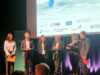 Konferansier Arne Hjetlnes i dialog med Aibel, Harbour Energy, Equinor, OMV og Aker BP.